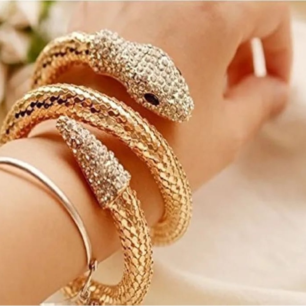 Gold and Silver Snake-Inspired Bracelet with Crystal Embellishments
